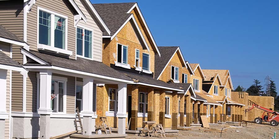 Row of houses being built.