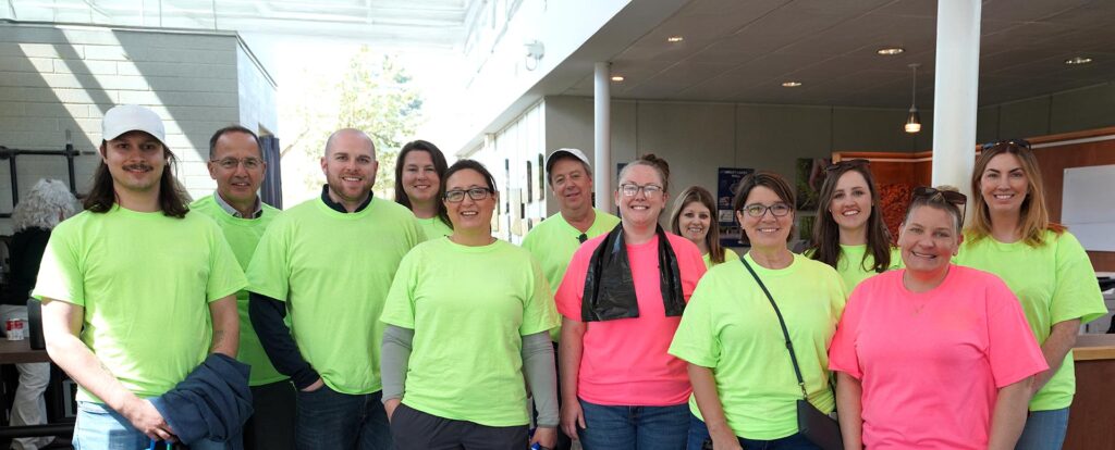 Coworkers posed after a volunteering event