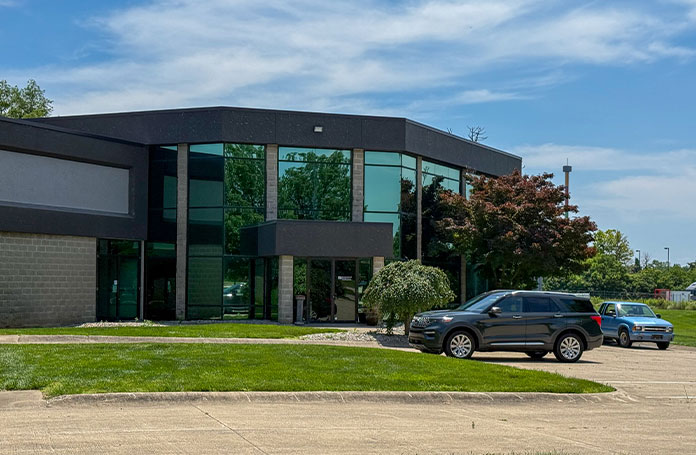 Exterior view of the Mason office with large glass reflective windows