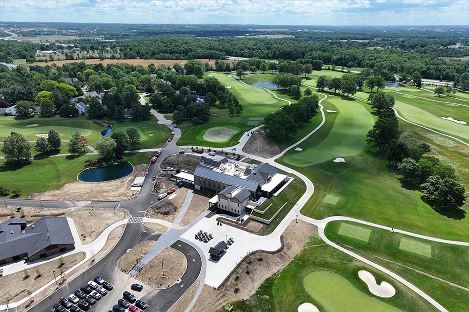 Aerial view of a golf course and the parking lot