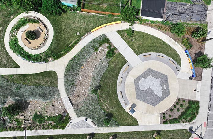 Circular path made of concrete with the shape of Africa in the middle