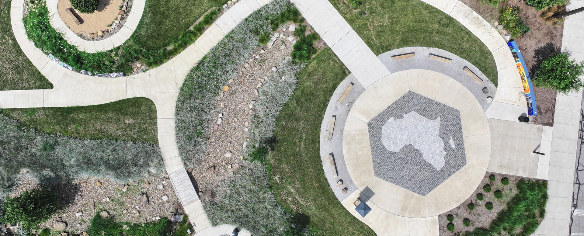 Circular path made of concrete with the shape of Africa in the middle