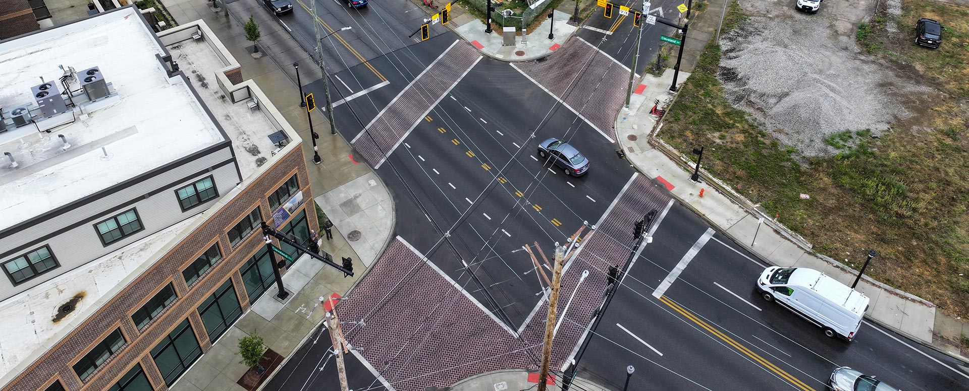 Aerial view of a busy intersection with walkways on all sides